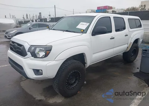 2013 Toyota Tacoma Base V6 z USA, uszkodzony, nr VIN 3TMLU4EN9DM113624